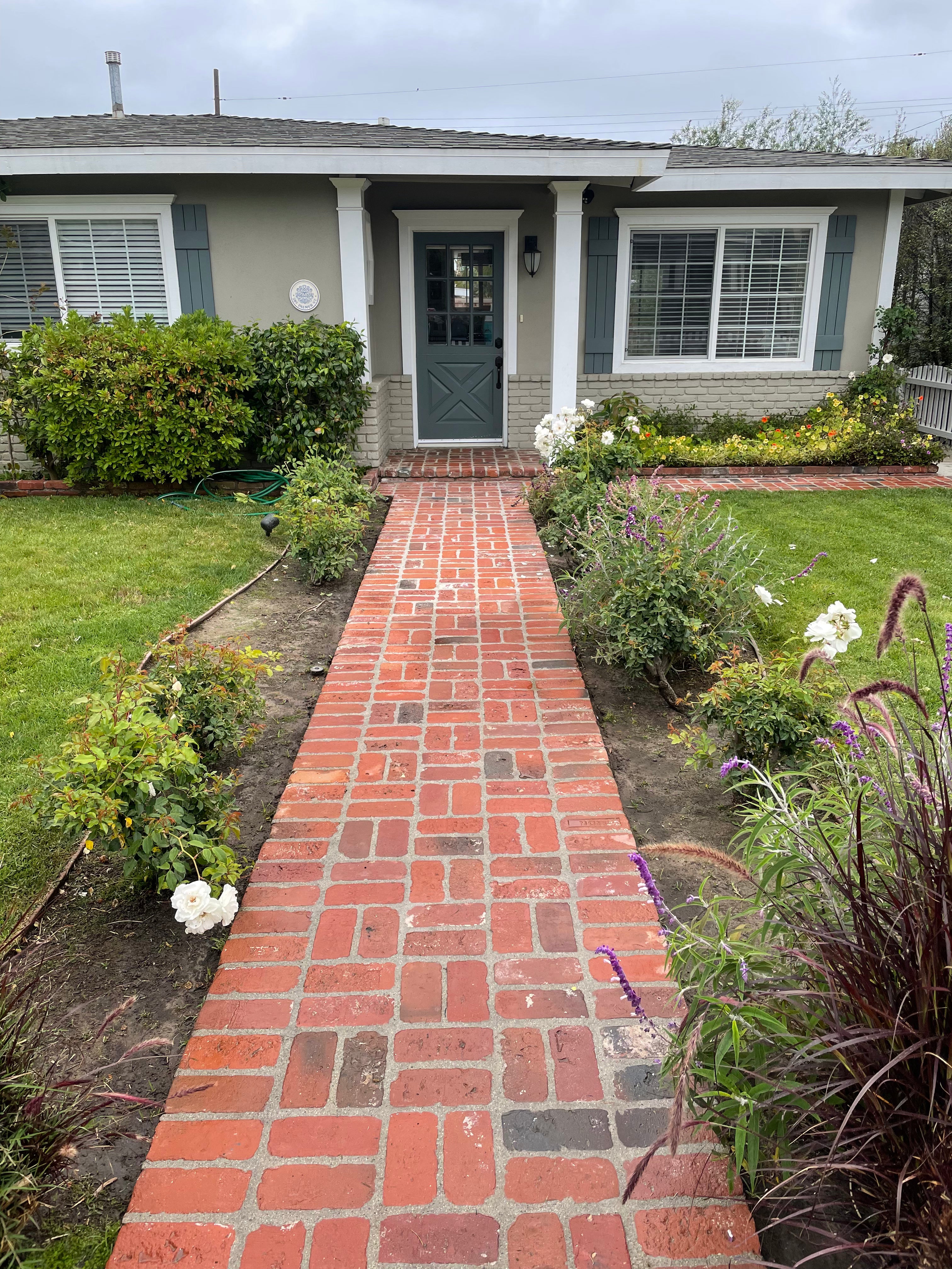 Front view of a house with clean exterior after pressure washing